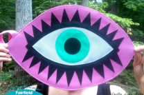Di$count Univer$e Inspired OlyFun Eye Clutch